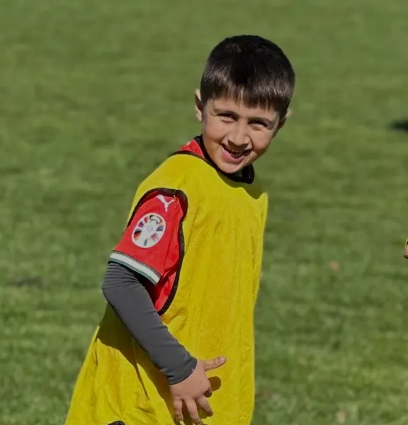 Confident N10 Academy player on the pitch